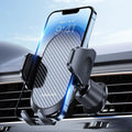 Car phone holder with smartphone on dashboard